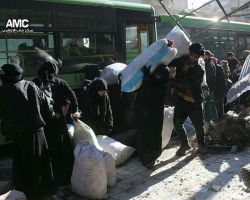 وصول أول قافلة من المحاصرين في حلب إلى مناطق سيطرة الثوار