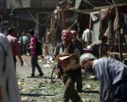 قاعدة حميميم : مفاوضات لفتح ممر إنساني إلى الغوطة المحاصرة