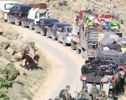 حزب الله يعيد قافلة ثانية من النازحين السوريين في عرسال إلى سورية