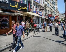 تركيا تدعو منظمة التجارة العالمية إلى تأمين فرص عمل للاجئين السوريين