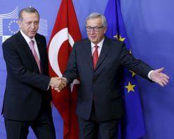 أردوغان يهدد الاتحاد الأوروبي بفتح الحدود أمام اللاجئين.. وميركل ترد