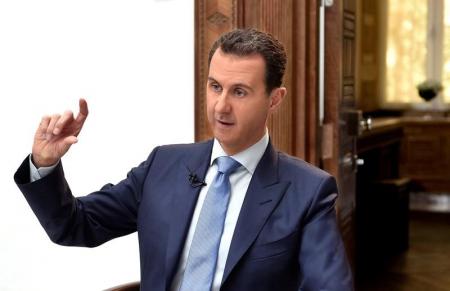 الأسد يتهم واشنطن بفبركة 