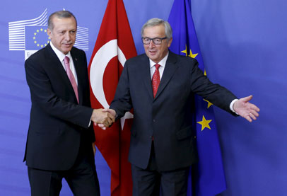 أردوغان يهدد الاتحاد الأوروبي بفتح الحدود أمام اللاجئين.. وميركل ترد